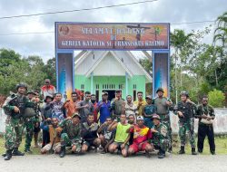 Satgas Yonif 122/TS Renovasi Gapura Gereja St.Fransiskus Kalimo Perbatasan Papua