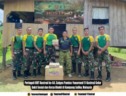 Peringati HUT Kostrad ke-64, Satgas Pamtas Yonarmed 11 Kostrad Gelar Bakti Sosial dan Karya Bhakti di Kampung Saliku, Malaysia