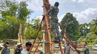 Pengabdian Satgas Yonif 762/VYS Gotong Royong Bangun Masjid Bersama Masyarakat