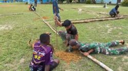 Pos Jagiro Satgas Pamtas Yonif 642/Kps Gotong-Royong Membangun Tenda OMK di Kampung Jagiro