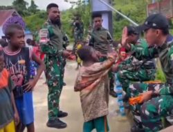 Satgas Pamtas Yonif 763/SBA Berbagi Kebahagiaan dengan Memberikan Makanan Untuk Masyarakat